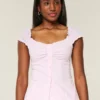 Blusa de popeline com ombros à mostra