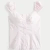 Blusa de popeline com ombros à mostra