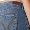 Calças de ganga boot curvy de cintura média e lavagem média