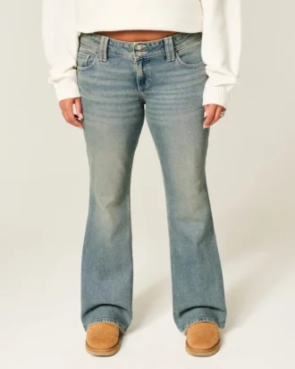 Calças de ganga bootcut com cintura baixa, bordado em forma de borboleta e lavagem média
