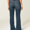 Calças de ganga bootcut com cintura baixa, lavagem escura e cinto