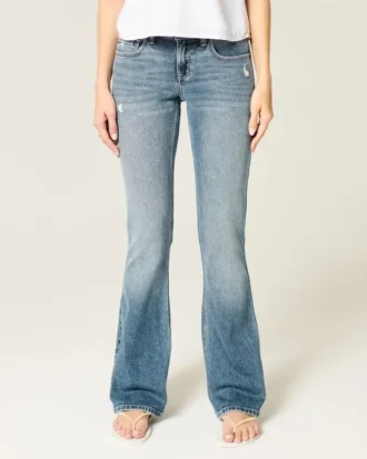 Calças de ganga bootcut de cintura baixa com lavagem média desgastada