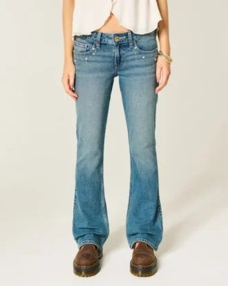 Calças de ganga bootcut de cintura baixa com lavagem média e tachas
