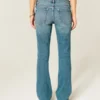 Calças de ganga bootcut de cintura baixa com lavagem média e tachas