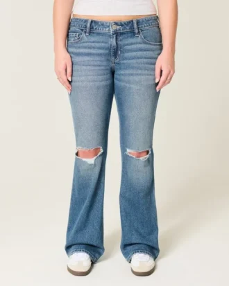 Calças de ganga bootcut de cintura baixa, rasgadas e lavagem média