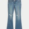 Calças de ganga bootcut de cintura baixa, rasgadas e lavagem média