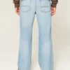 Calças de ganga bootcut relaxadas com lavagem clara