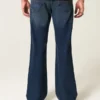 Calças de ganga bootcut relaxadas com lavagem escura