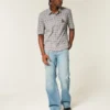 Calças de ganga bootcut relaxadas com lavagem média