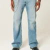 Calças de ganga bootcut relaxadas com lavagem média