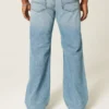 Calças de ganga bootcut relaxadas com lavagem média