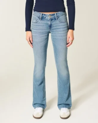 Calças de ganga de cintura baixa com lavagem média e corte bootcut