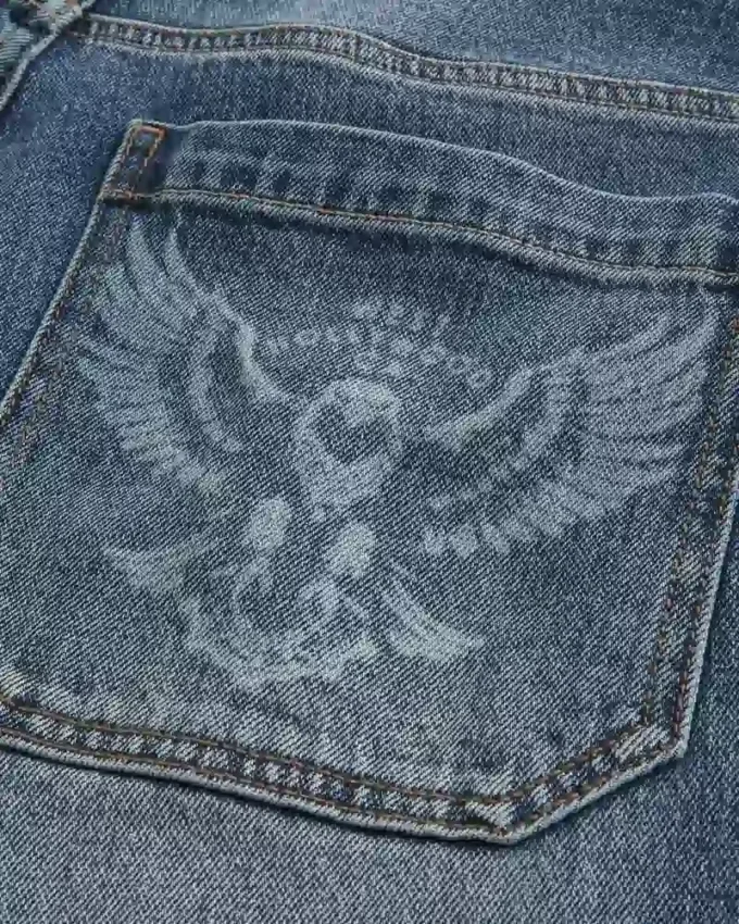 Calças de ganga largas com gráfico Eagle em lavagem média