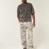 Calças de ganga largas estilo skater com padrão camuflado