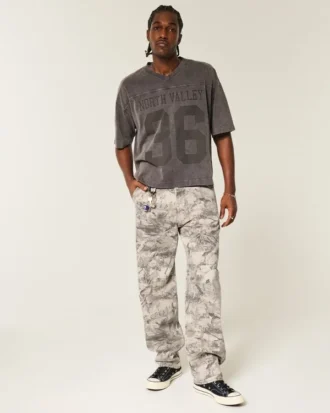 Calças de ganga largas estilo skater com padrão camuflado