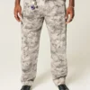 Calças de ganga largas estilo skater com padrão camuflado