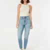 Calças de ganga mom jeans curvilíneas de cintura ultra alta e lavagem média