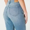 Calças de ganga mom jeans curvilíneas de cintura ultra alta e lavagem média