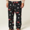 Calças de pijama de flanela com estampado Tom e Jerry