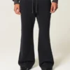 Calças de treino bootcut Calças de treino bootcut