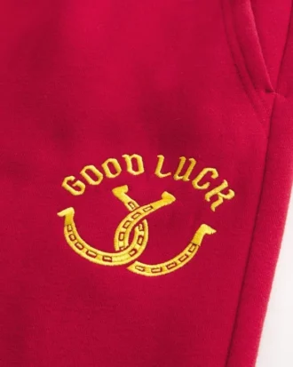 Calças de treino bootcut com gráfico Good Luck