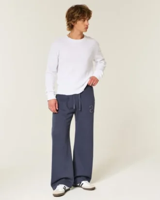 Calças de treino bootcut com número gráfico