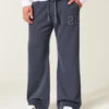 Calças de treino bootcut com número gráfico