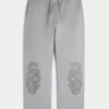 Calças de treino largas com estampado Double Snake