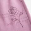 Calças de treino largas com padrão rosa brilhante