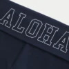Calças largas com cintura dobrável e estampado Aloha