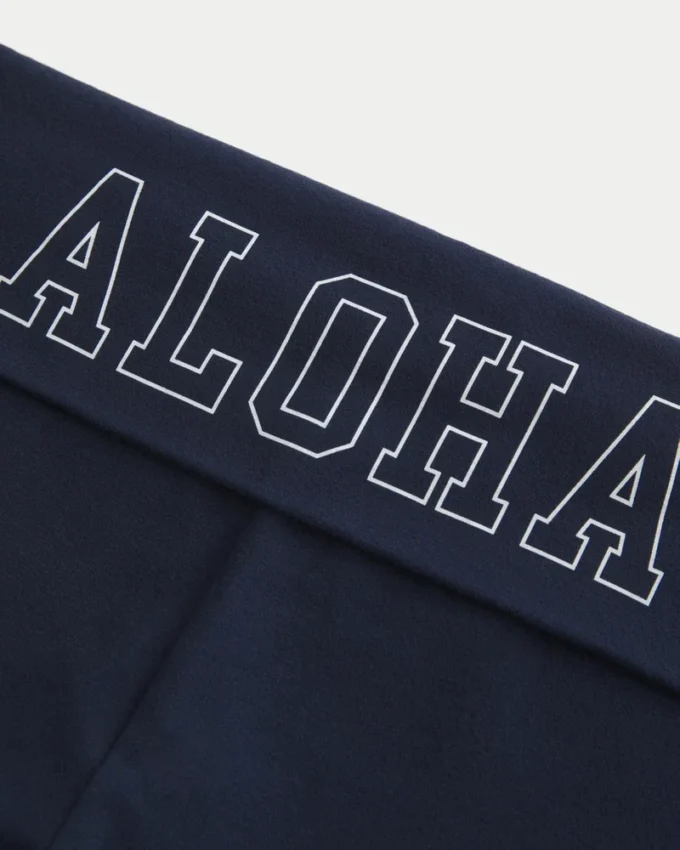 Calças largas com cintura dobrável e estampado Aloha