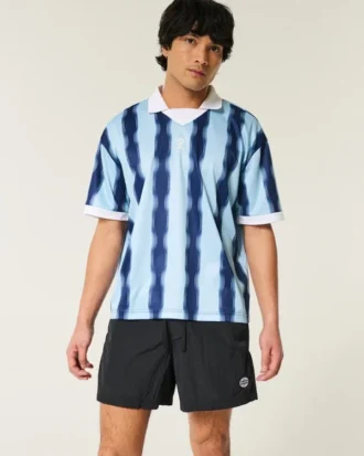 Calções de futebol até ao meio da coxa