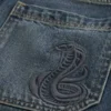 Calções de ganga largos com padrão de cobra