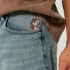 Calções de ganga super largos com estampado Taz e lavagem média