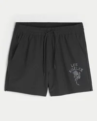 Calções desportivos com estampado até meio da coxa
