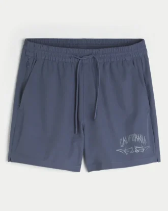 Calções desportivos com estampado até meio da coxa