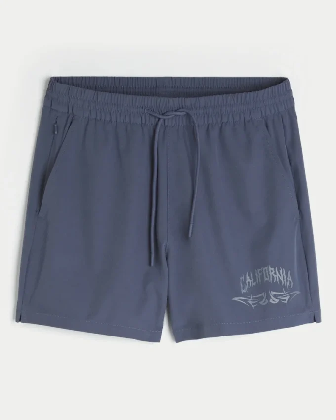 Calções desportivos com estampado até meio da coxa