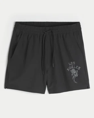 Calções desportivos com estampado até meio da coxa