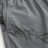 Calções desportivos com estampado até meio da coxa Calções desportivos com estampado até meio da coxa