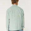 Camisa com botões em mistura de linho