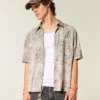 Camisa de manga curta com bolsos