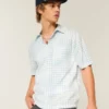 Camisa de manga curta com bolsos