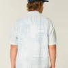 Camisa de manga curta com bolsos