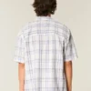 Camisa de manga curta com bolsos