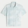 Camisa de manga curta com bolsos