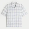 Camisa de manga curta com bolsos
