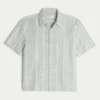 Camisa de manga curta com riscas texturadas