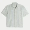 Camisa de manga curta com riscas texturadas