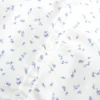 Camisa de manga curta em popeline elástico com botões