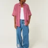 Camisa folgada de manga curta